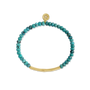 Turquoise beaded bracelet with gold accents on a white background-1