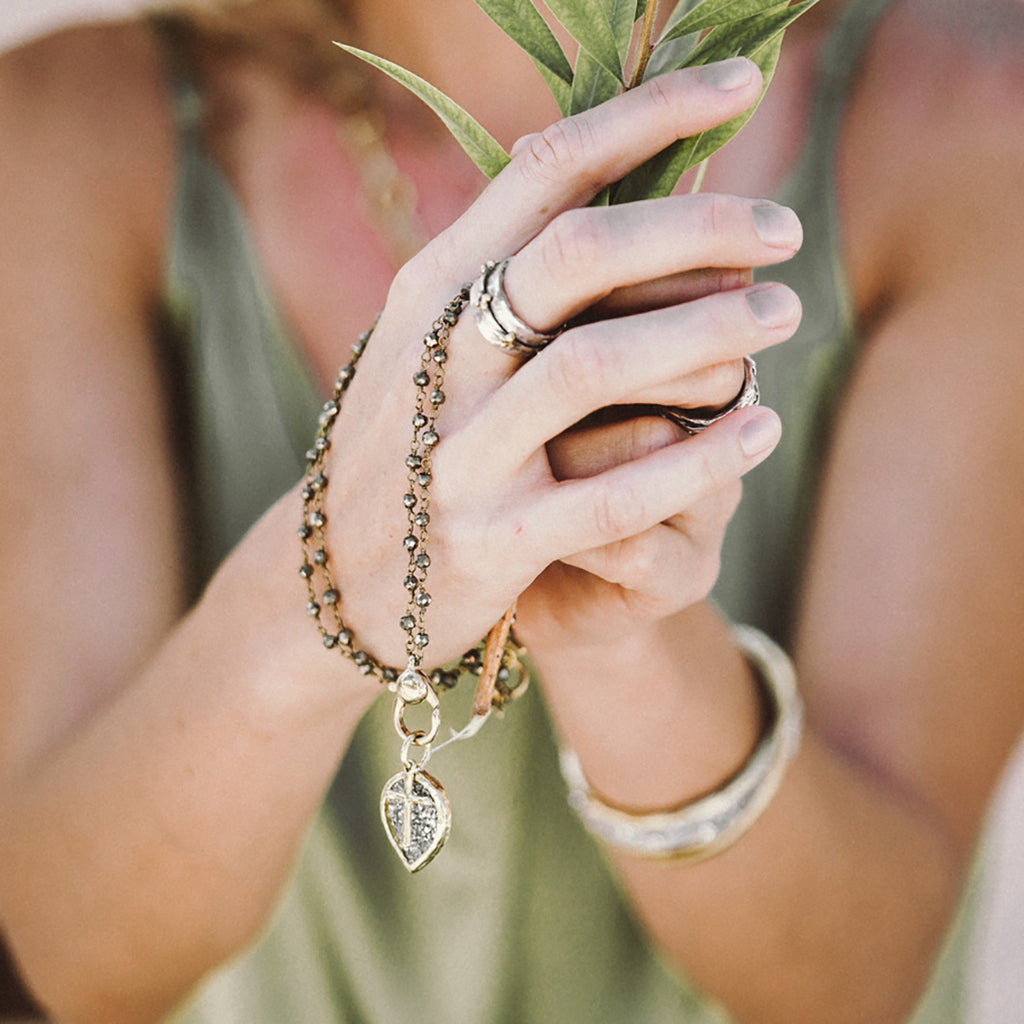 Faith Spinner Ring Waxing Poetic