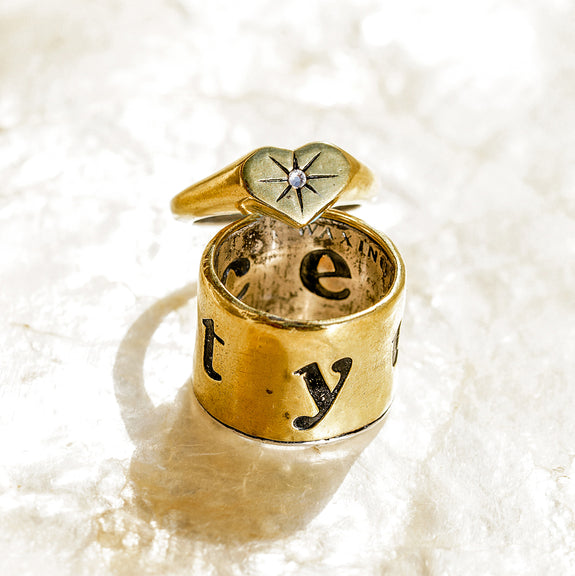 Peace in Unity Band Spinner Ring Waxing Poetic